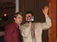 Chad and Brian film Mike taking their photo