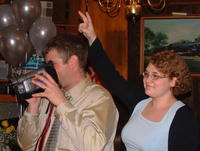 Allison gives Brian some bunny ears