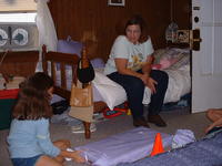 Mom watches as Ashlyn opens her present