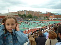 Kayla patiently watches her sister out on the field