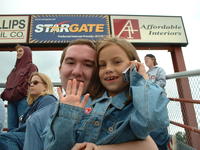 Mike and Kayla, on the cell phone