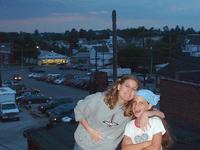 6-15-02, Heather & Ashlyn on the roof, Henicle's in the background