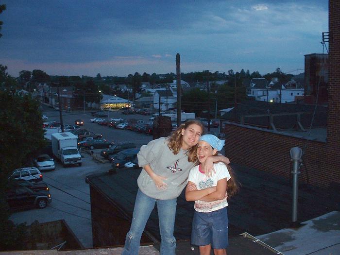 6-15-02, Heather & Ashlyn on the roof, Henicle's in the background