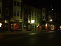 The hanging sign is brighter than the street lights (6-29-02)