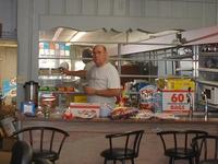 7-12-02, Dad stocking the shelves