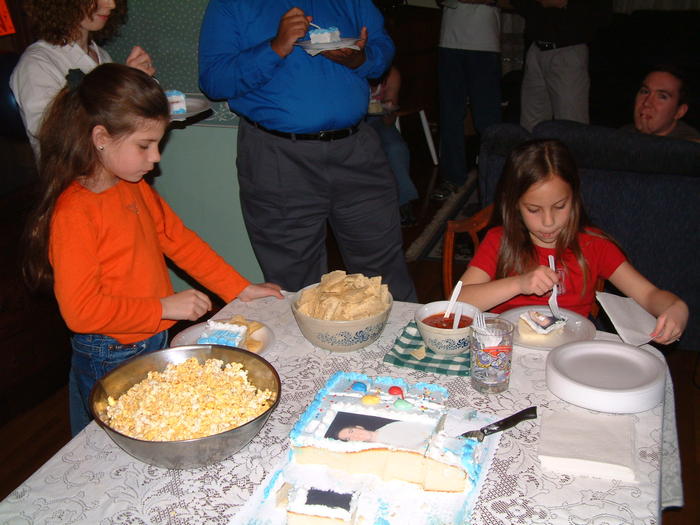 Ashlyn and Kayla enjoy the cake