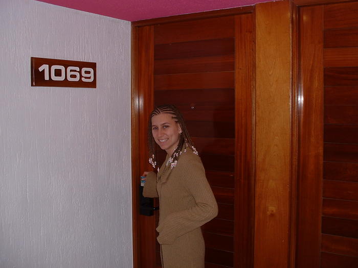 Heather in front of our room