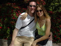 Michael & Heather by flowers in Epcot