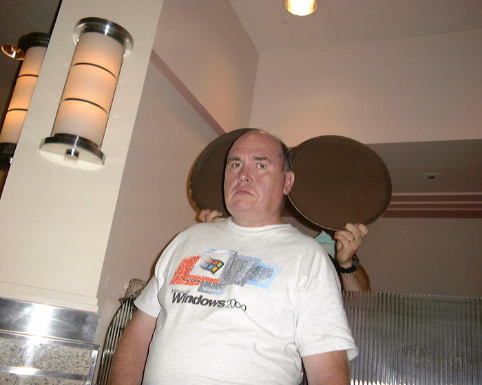 Dad unknowningly grows Mickey ears