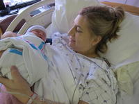 Mommy gets to hold Cameron for the first time
