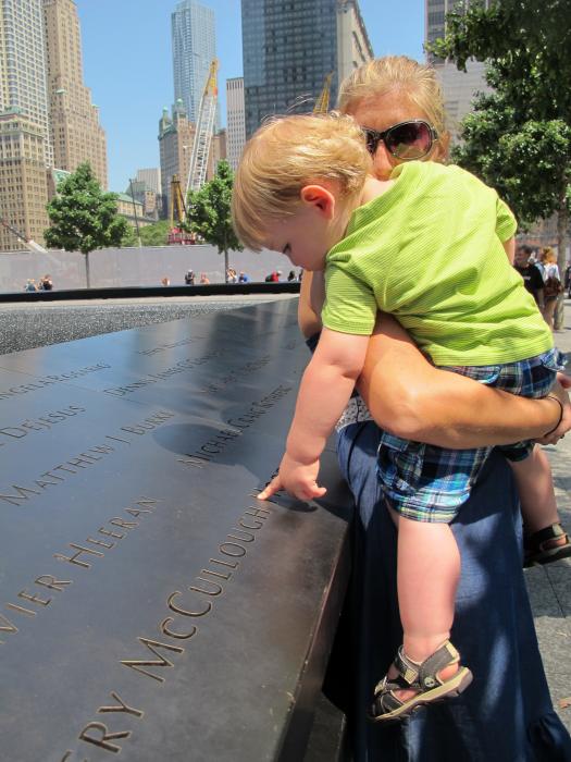 Cameron inspecting the names. (North pool.)