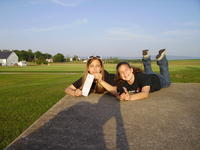 Something Shady (GCM7YW) - Kayla and Ashlyn with Mike's shadow.