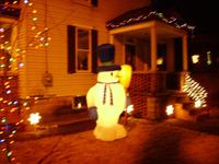 Our 8' tall snowman, guarding the house.