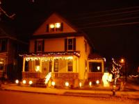 Note the star and presents in the attic windows.