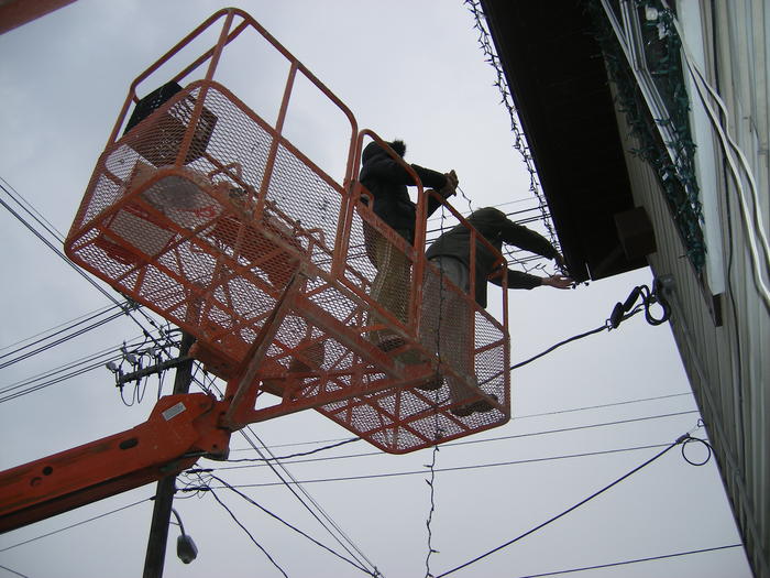 Mike & Heather putting up more lights!
