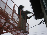 Mike & Heather putting up more lights!