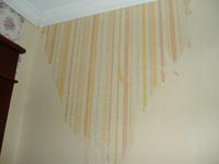After some wallpaper removal, we find another layer