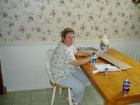 Mom at our new table!