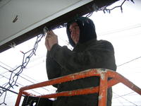 Mike hanging lights.