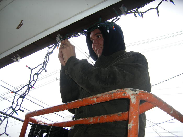 Mike hanging lights.