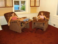Ashlyn and Kayla testing the chairs
