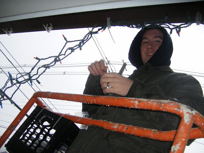 Mike hanging lights in the rain!