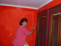 Rayelle helping with the paint in the master bedroom