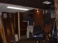 Mike working on removing some walls in the basement