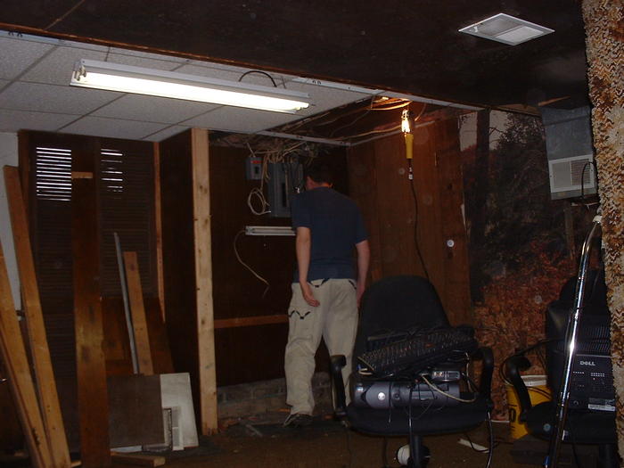 Mike working on removing some walls in the basement