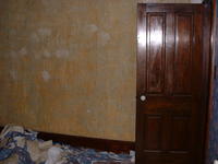 Wallpaper is being removed from Mike's office