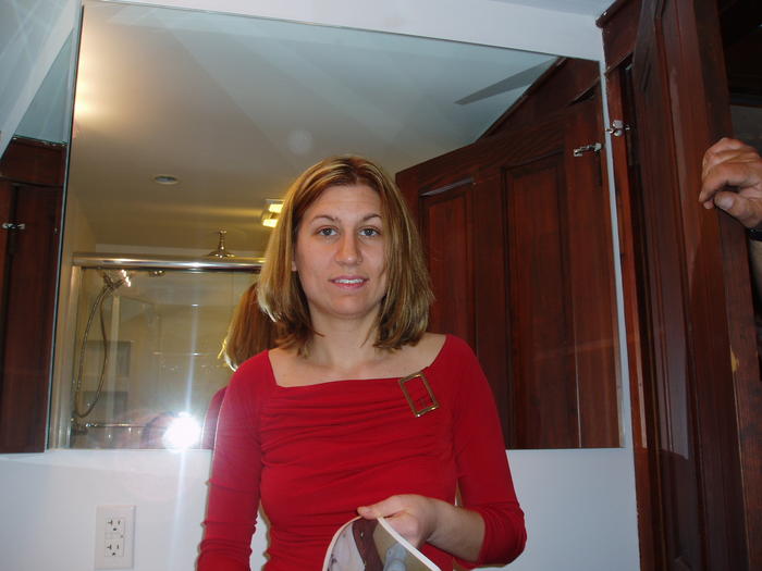 Heather next to mirror wall