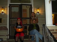Heather and her sisters handing out candy