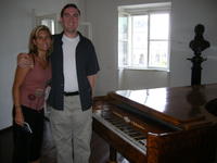 Heather & Mike by a piano that Beethoven played