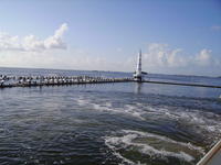 The lighthouse and waverunners.