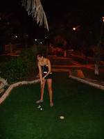 Heather golfing.