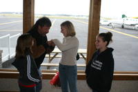 Heather's father checks out the ring with Heather's sisters